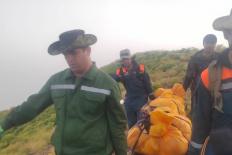 Tajik rescuers carry out operation to evacuate Russian killed in mountains