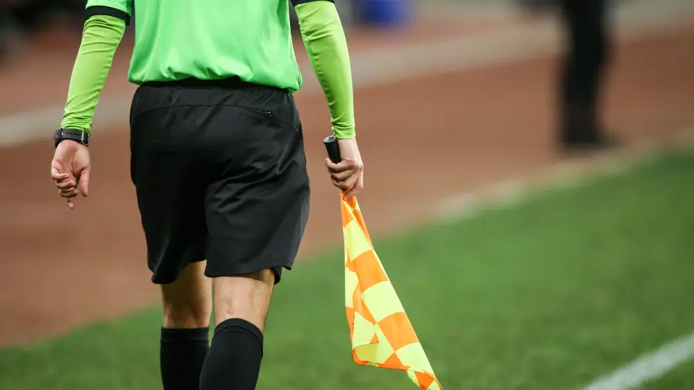 A UEFA referee has been arrested on suspicion of sexually assaulting a teenager.