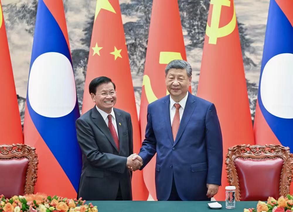 Xi Jinping and Thongloun Sisoulith outlined new areas of cooperation at a meeting in Beijing.