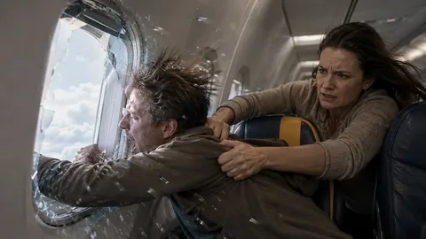 A Ryanair passenger was nearly sucked out of a window during a flight.